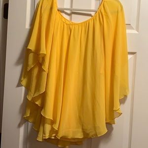 Bright yellow flowing plus size top
